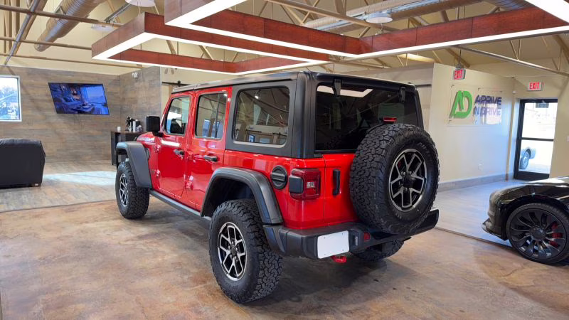 2025 Red Jeep Wrangler 4 Door Rubicon X Sport Utility 4D 4X4