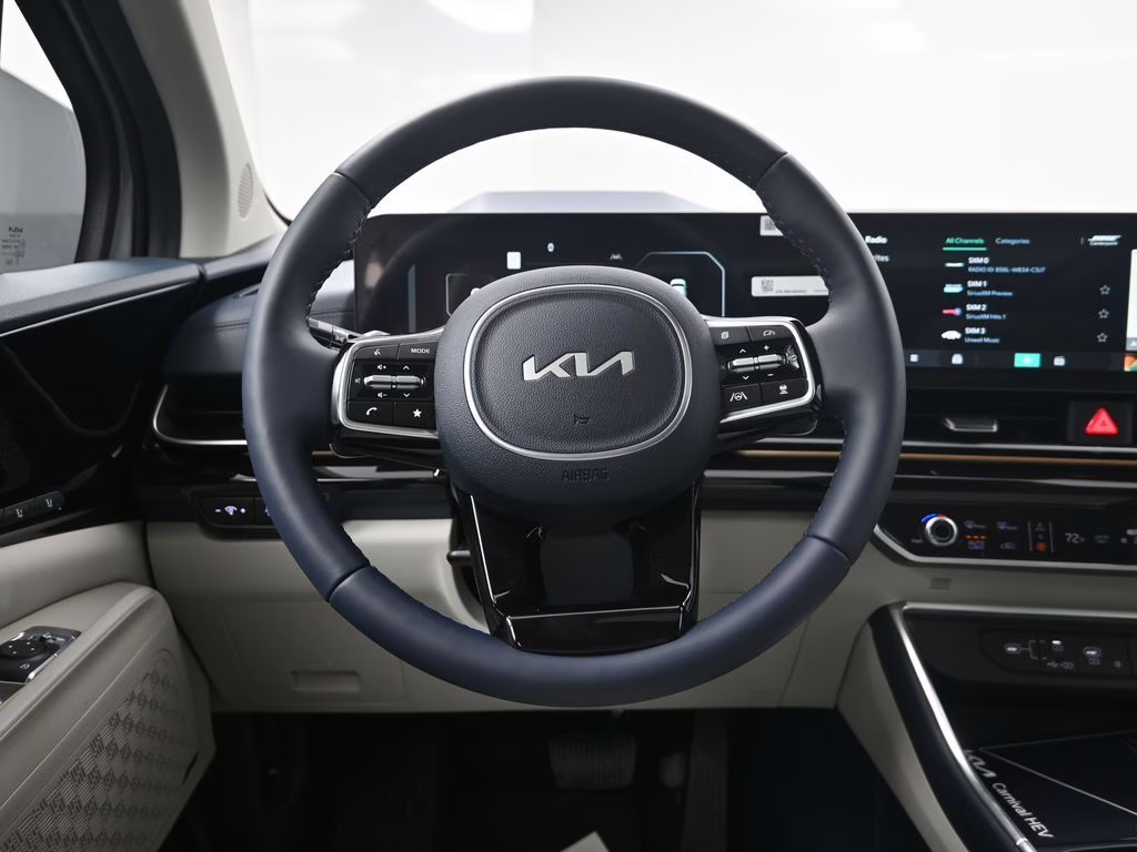 2026 Ceramic Silver Kia Carnival Hybrid SX Prestige FWD Van