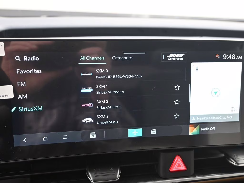 2026 Ceramic Silver Kia Carnival Hybrid SX Prestige FWD Van