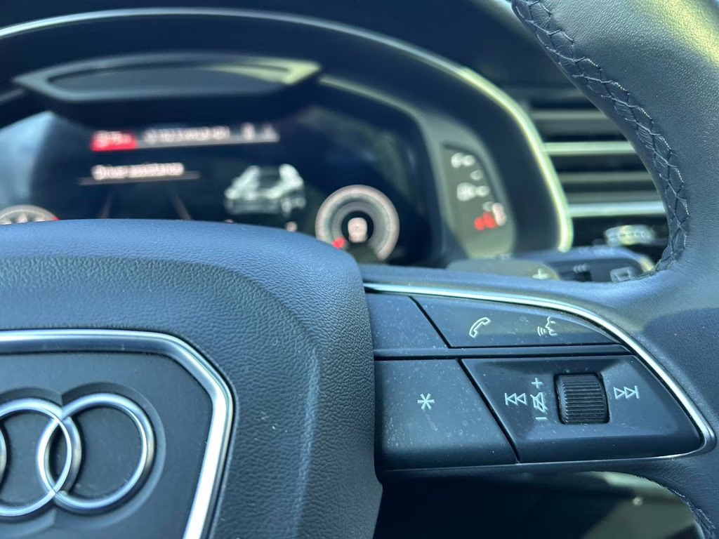 2022 Florett Silver Metallic Audi Q7 55 Premium AWD SUV