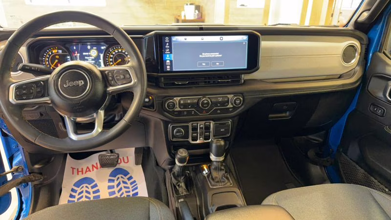 2024 Blue Jeep Wrangler 4 Door Sahara Sport Utility 4D 4X4
