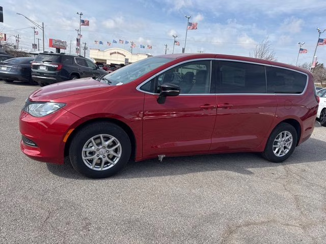 2026 Red Chrysler Voyager LX FWD Van