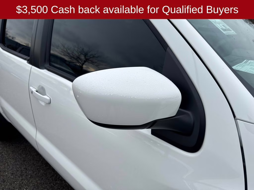 2026 Glacier White Nissan Frontier SV 4X4 Truck