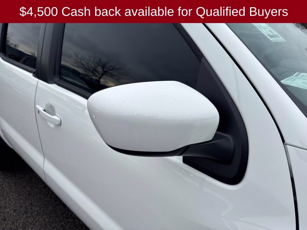 2026 Glacier White Nissan Frontier SV 4X4 Truck