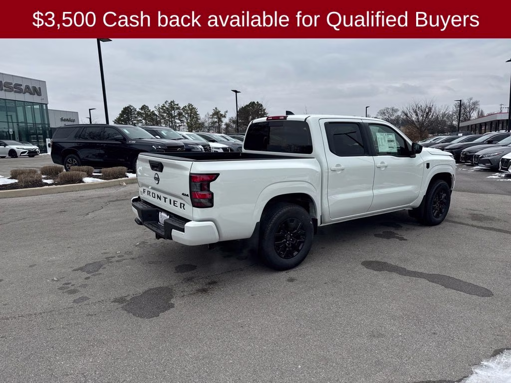 2026 Glacier White Nissan Frontier SV 4X4 Truck