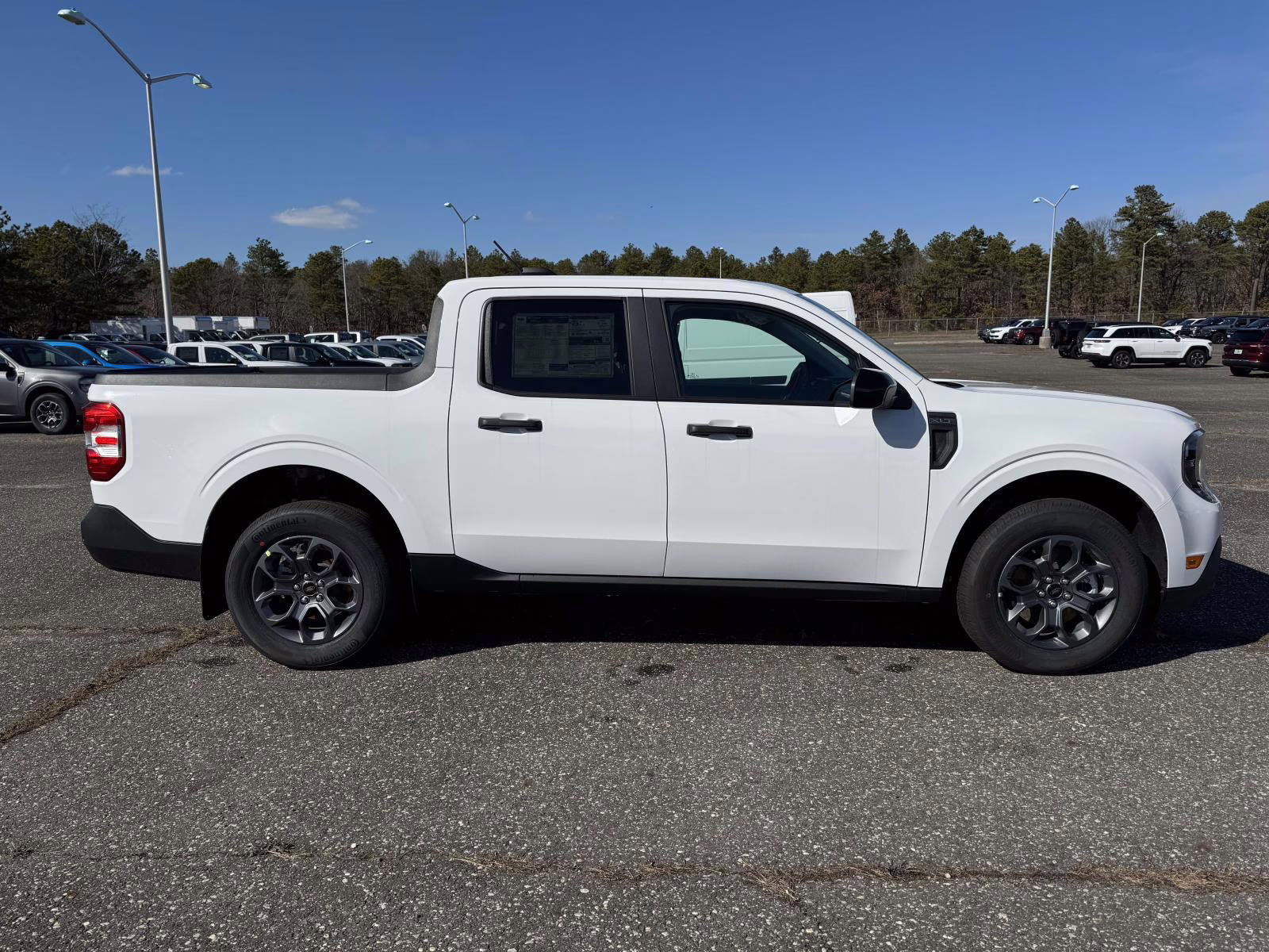 2026 Oxford White Ford Maverick XLT AWD SuperCrew AWD Truck
