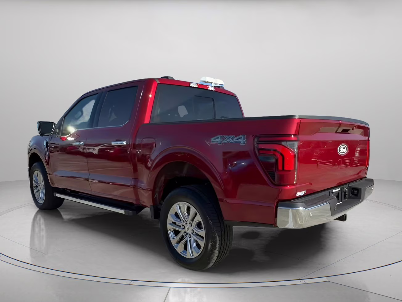2026 Ruby Red Metallic Tinted Clearcoat Ford F-150 LARIAT Crew Cab Pickup 4X4 Truck