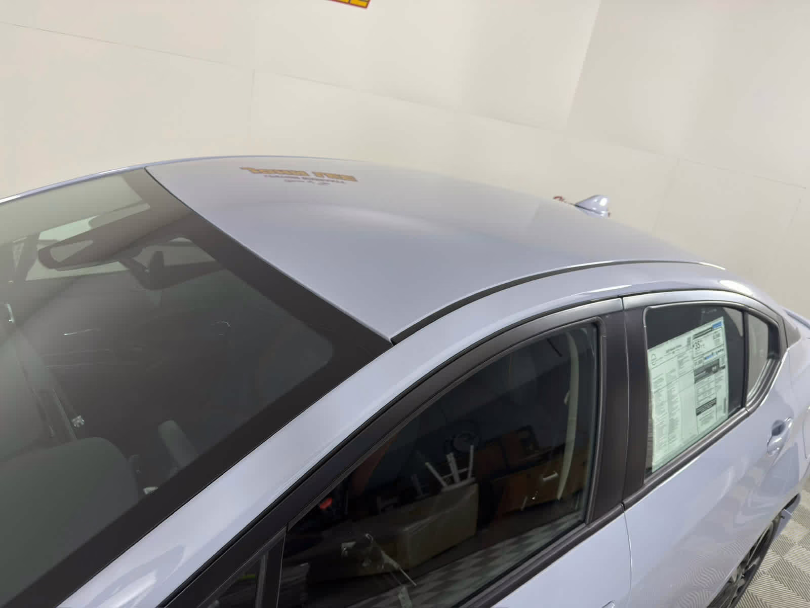 2025 Gray Sky Pearl Nissan Versa SR FWD Sedan