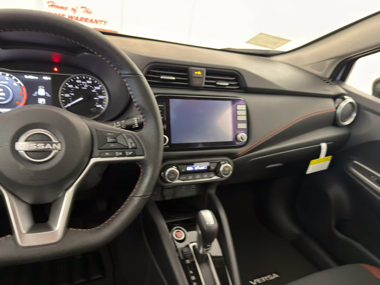 2025 Gray Sky Pearl Nissan Versa SR FWD Sedan