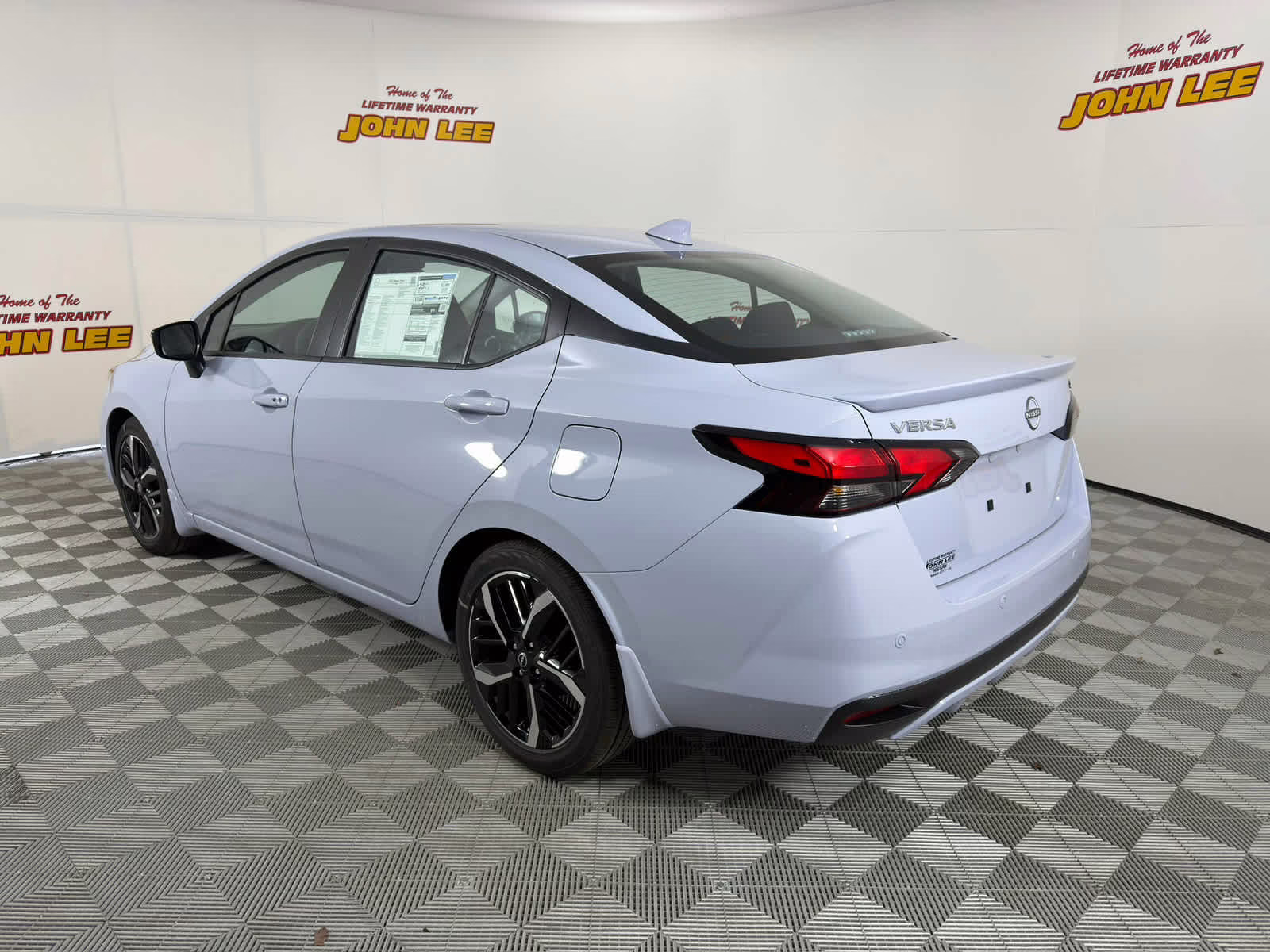 2025 Gray Sky Pearl Nissan Versa SR FWD Sedan