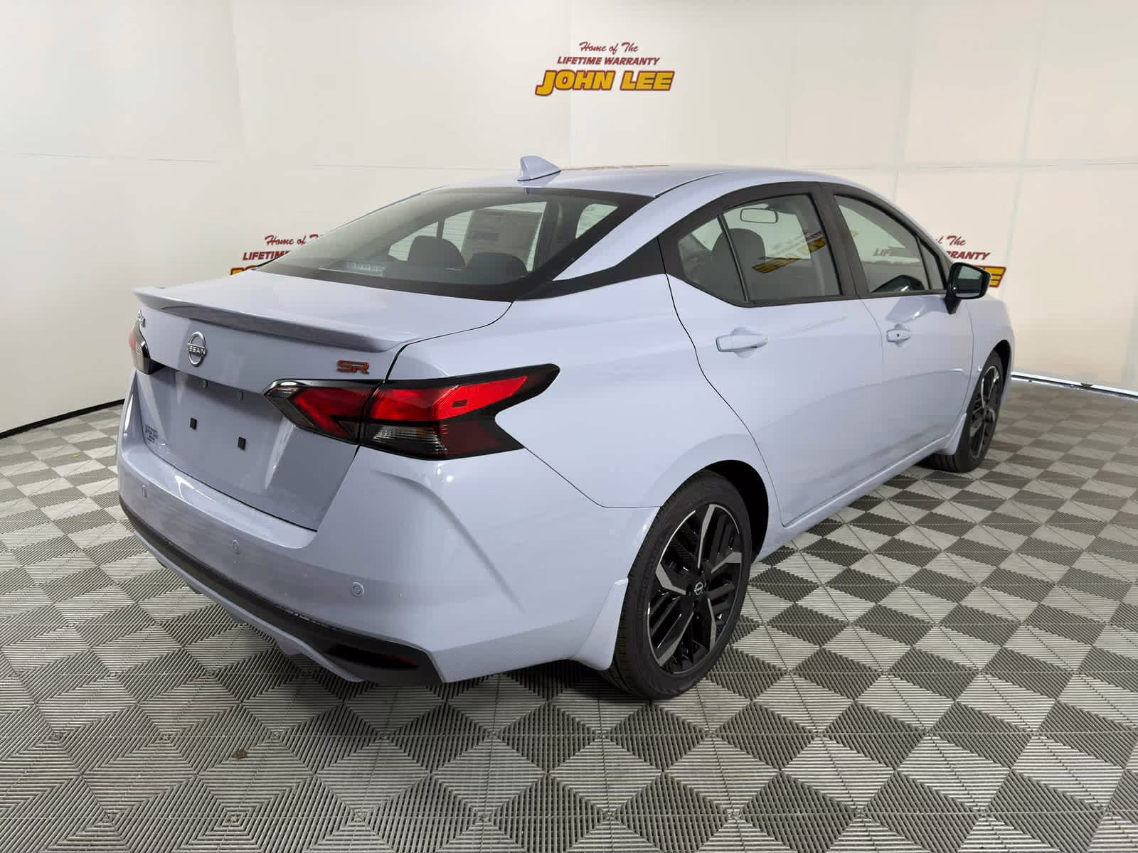 2025 Gray Sky Pearl Nissan Versa SR FWD Sedan