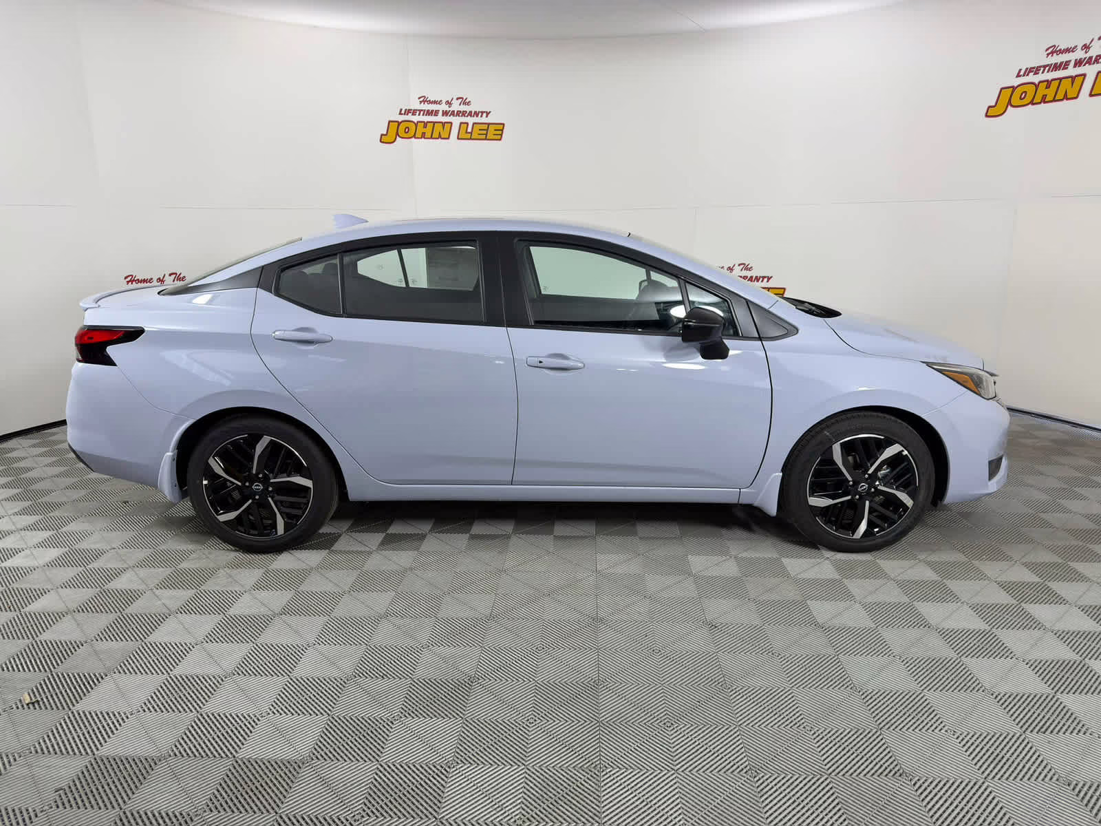 2025 Gray Sky Pearl Nissan Versa SR FWD Sedan