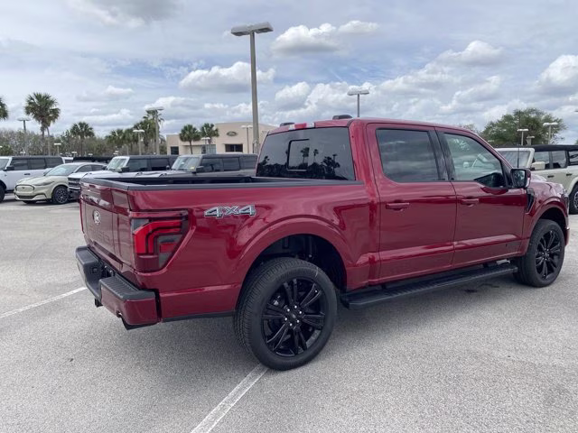 2026 Ruby Red Metallic Tinted Clearcoat Ford F-150 LARIAT 4X4 Truck