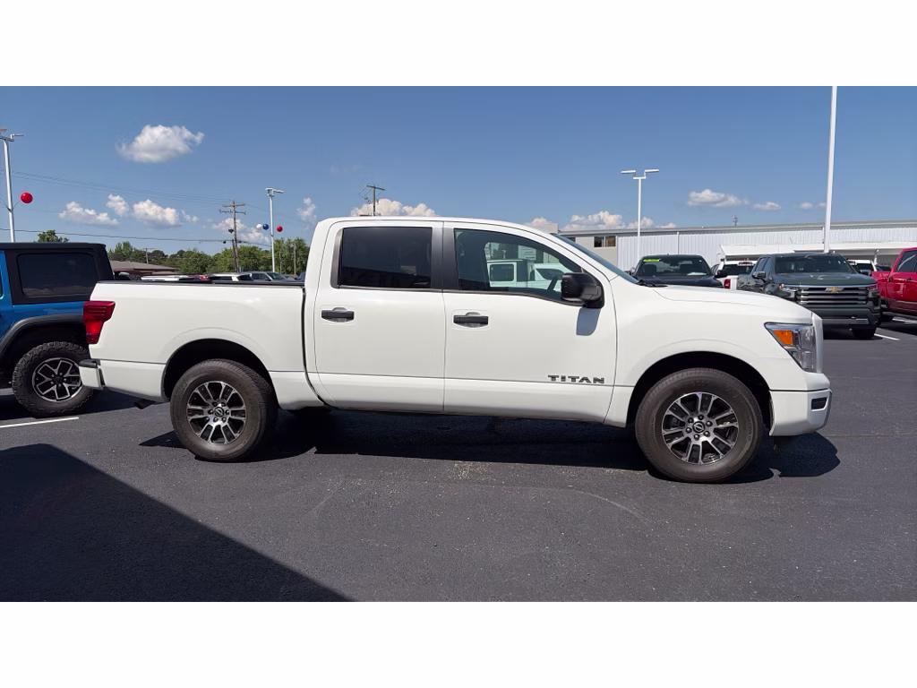 2023 Glacier White Nissan Titan SV 4X4 Truck