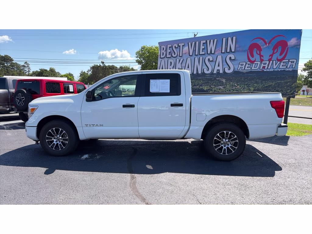 2023 Glacier White Nissan Titan SV 4X4 Truck