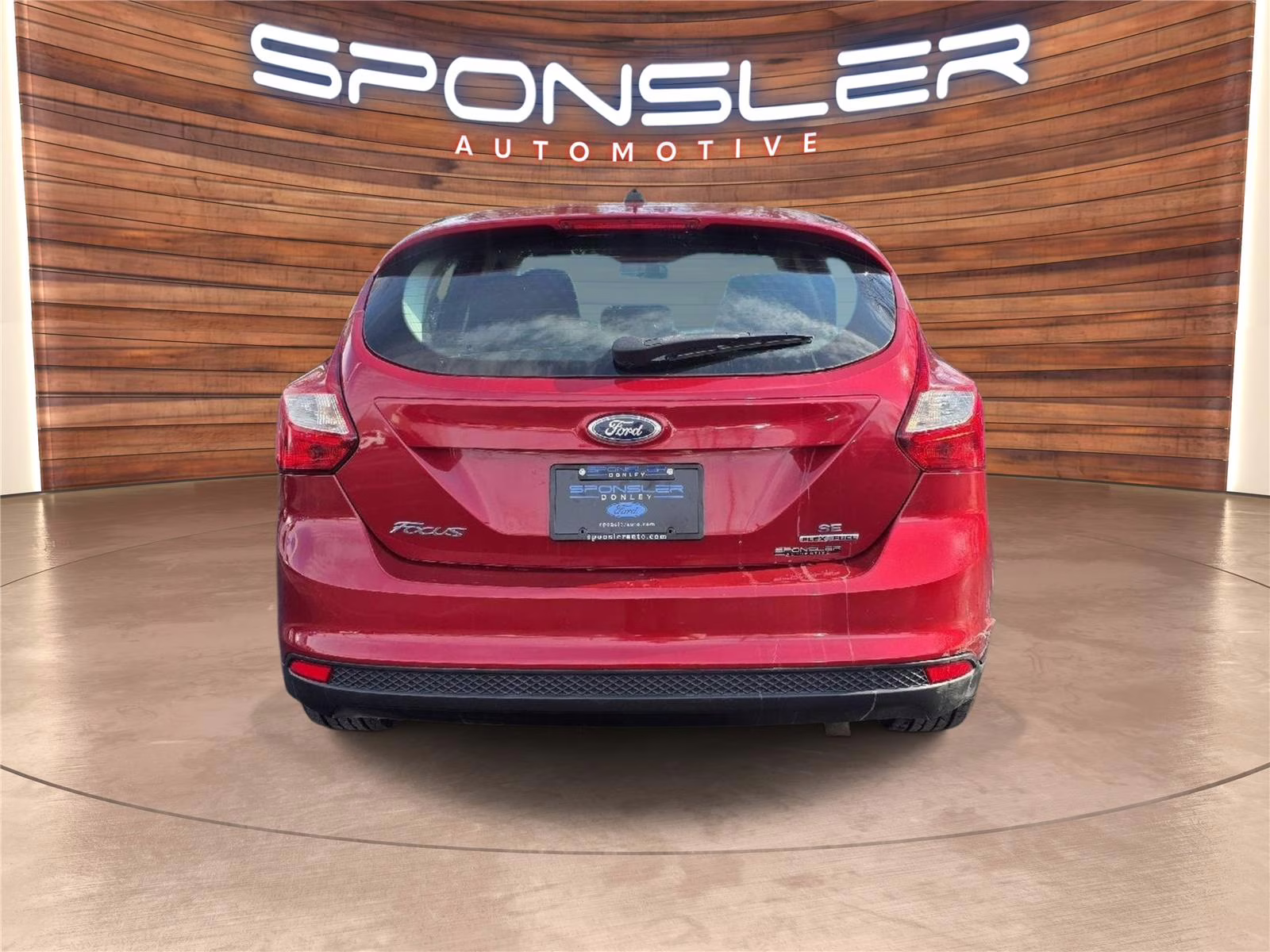 2012 Red Candy Metallic Tinted Clearcoat Ford Focus SE FWD Hatchback