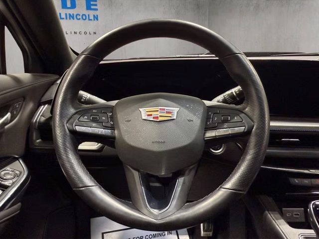 2025 Deep Sea Metallic Cadillac XT4 Sport AWD SUV