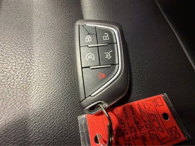 2025 Deep Sea Metallic Cadillac XT4 Sport AWD SUV