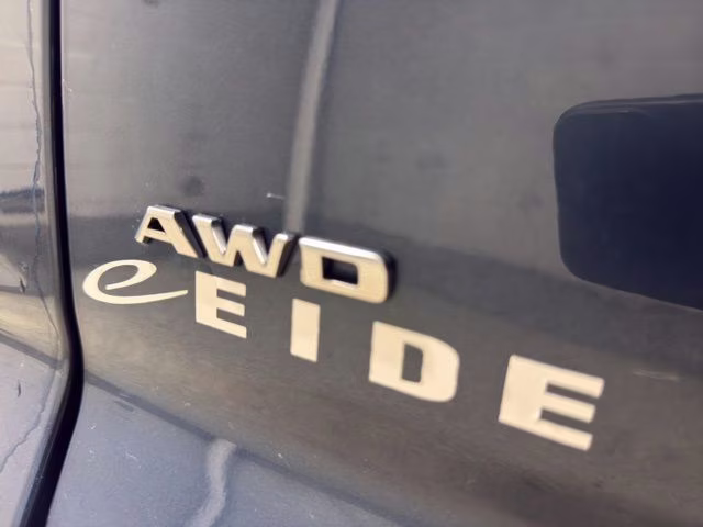 2025 Deep Sea Metallic Cadillac XT4 Sport AWD SUV