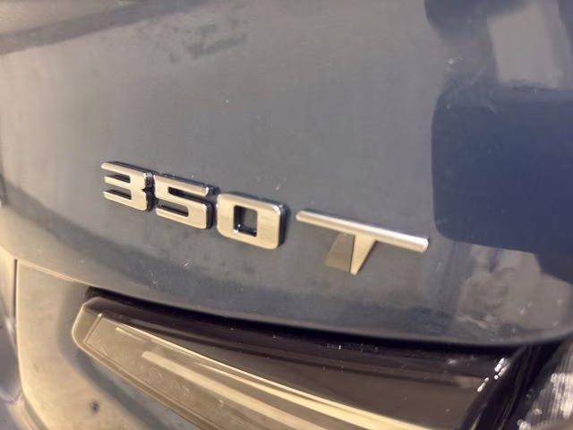 2025 Deep Sea Metallic Cadillac XT4 Sport AWD SUV