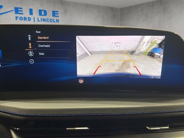 2025 Deep Sea Metallic Cadillac XT4 Sport AWD SUV