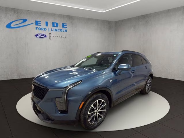 2025 Deep Sea Metallic Cadillac XT4 Sport AWD SUV