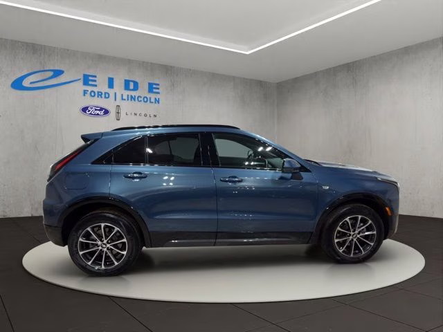 2025 Deep Sea Metallic Cadillac XT4 Sport AWD SUV