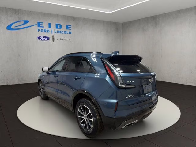 2025 Deep Sea Metallic Cadillac XT4 Sport AWD SUV