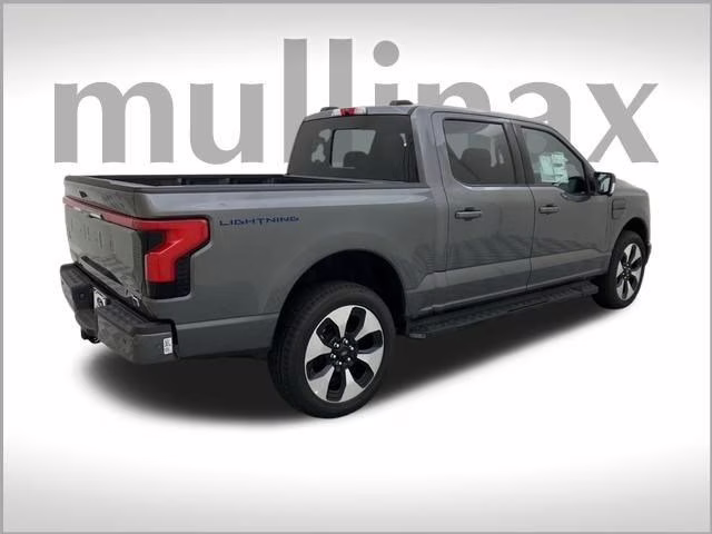 2023 Carbonized Gray Metallic Ford F-150 Lightning Platinum AWD Truck