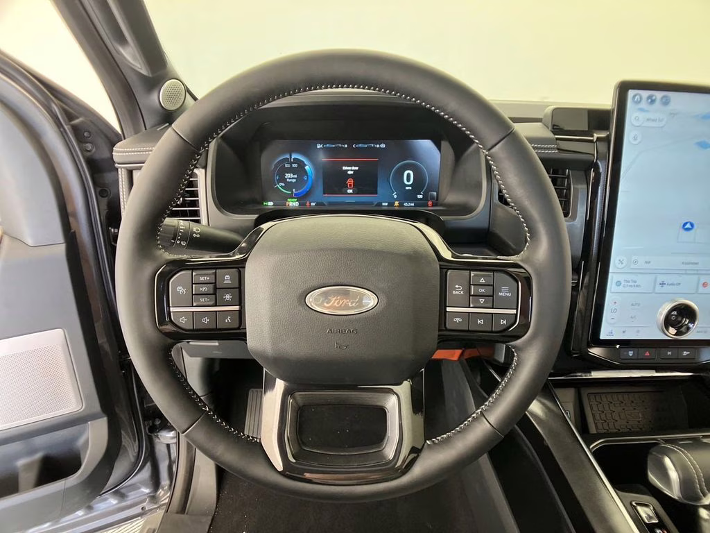 2023 Carbonized Gray Metallic Ford F-150 Lightning Platinum AWD Truck