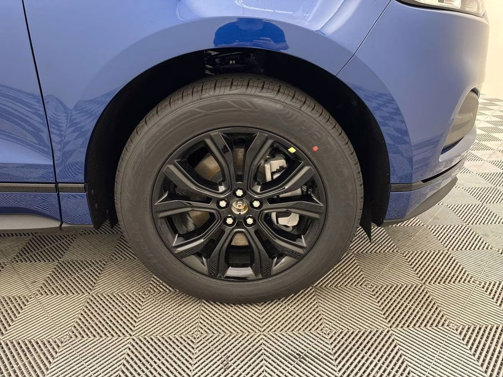 2024 Atlas Blue Metallic Ford Edge SE AWD SUV