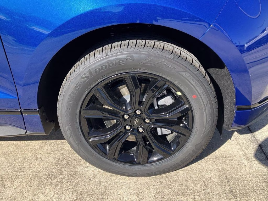 2024 Atlas Blue Metallic Ford Edge SE AWD SUV