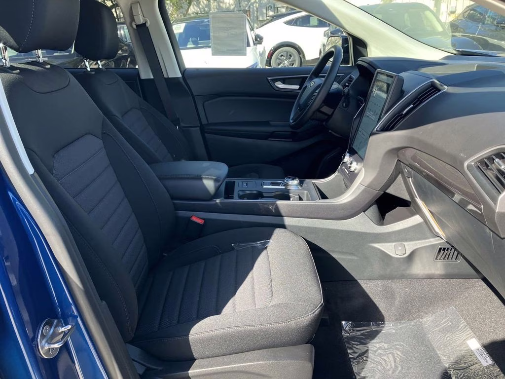 2024 Atlas Blue Metallic Ford Edge SE AWD SUV