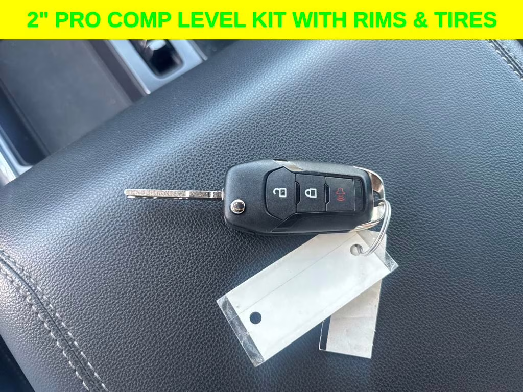 2024 Agate Black Metallic Ford F-150 STX DSI LEVELED & RIMS RWD Truck