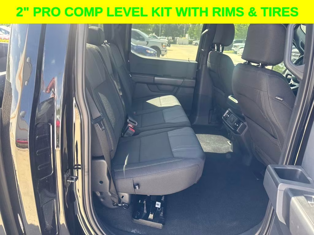 2024 Agate Black Metallic Ford F-150 STX DSI LEVELED & RIMS RWD Truck