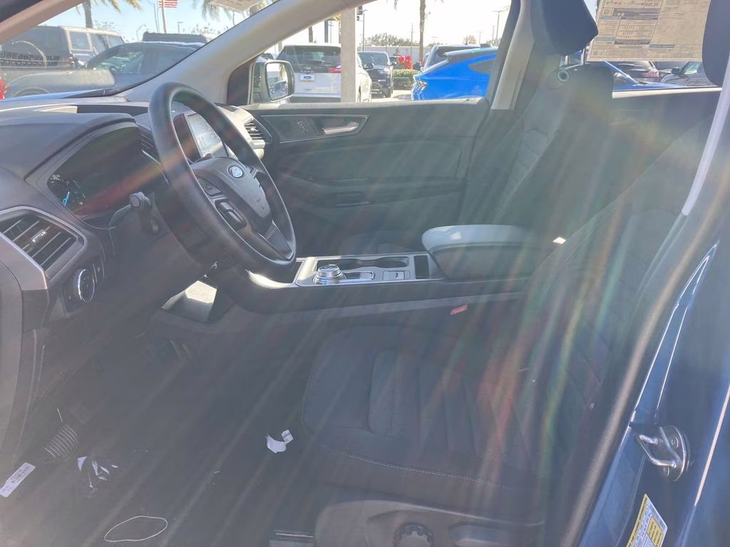 2024 Atlas Blue Metallic Ford Edge SE AWD SUV