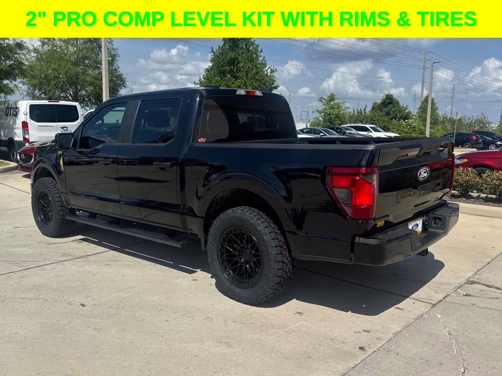 2024 Agate Black Metallic Ford F-150 STX DSI LEVELED & RIMS RWD Truck