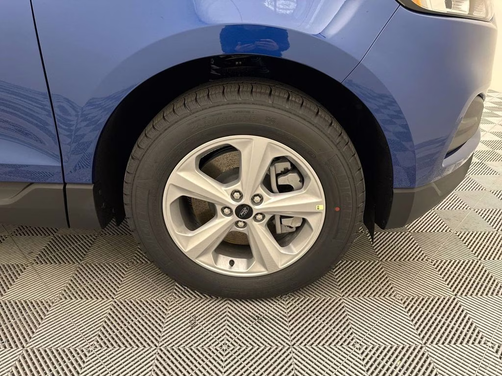 2024 Atlas Blue Metallic Ford Edge SE AWD SUV