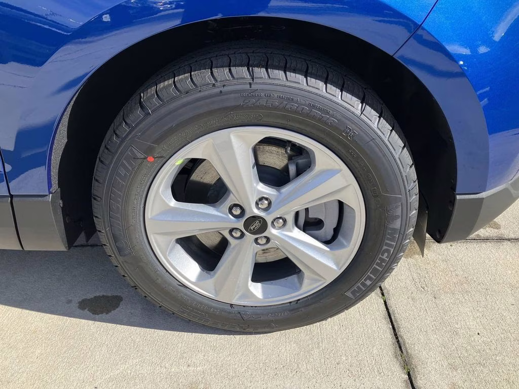 2024 Atlas Blue Metallic Ford Edge SE AWD SUV