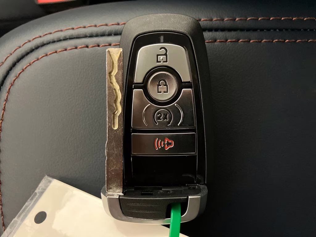 2026 Orange Fury Metallic Tri-Coat Ford Maverick Lariat AWD Truck