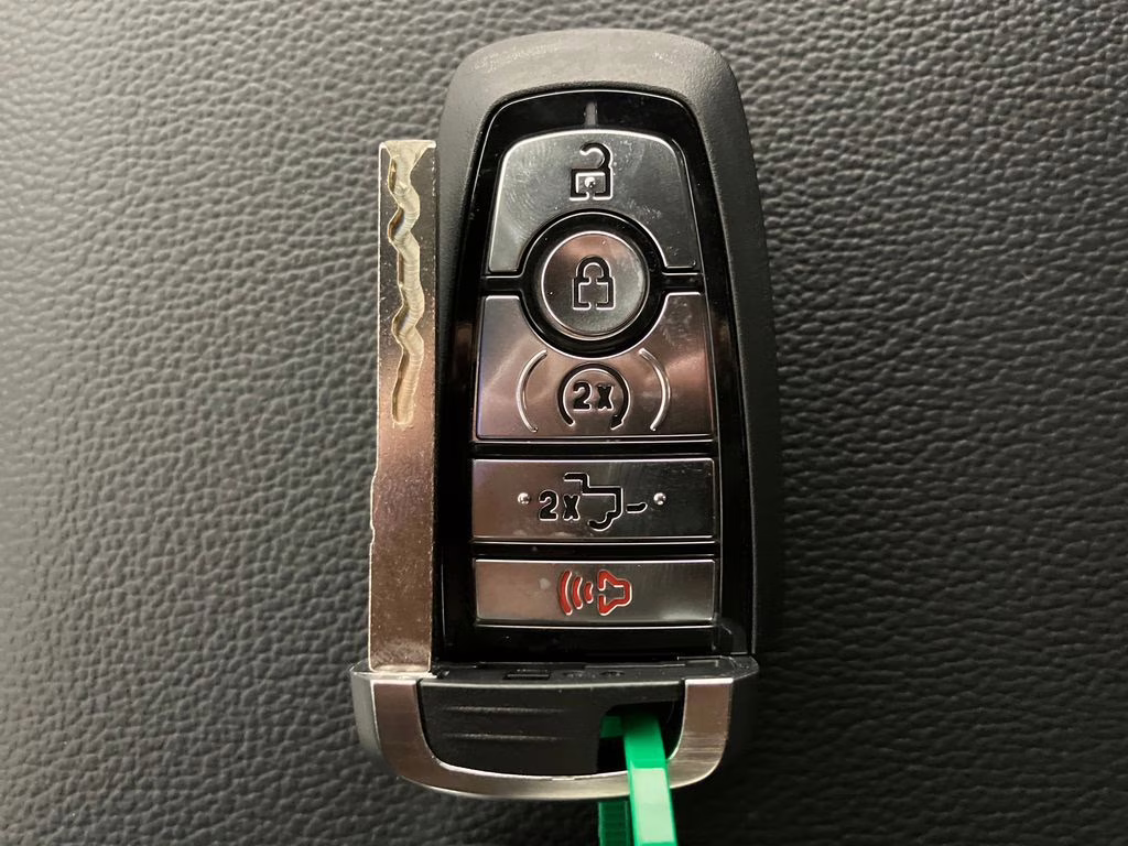 2026 Ruby Red Metallic Tinted Clearcoat Ford F-150 Lariat 4X4 Truck