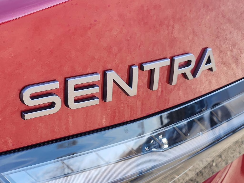 2026 Scarlet Ember Tintcoat Nissan Sentra SV FWD Sedan