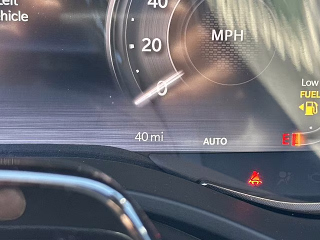 2026 Molten Red Pearlcoat Ram 1500 Limited 4X4 Truck