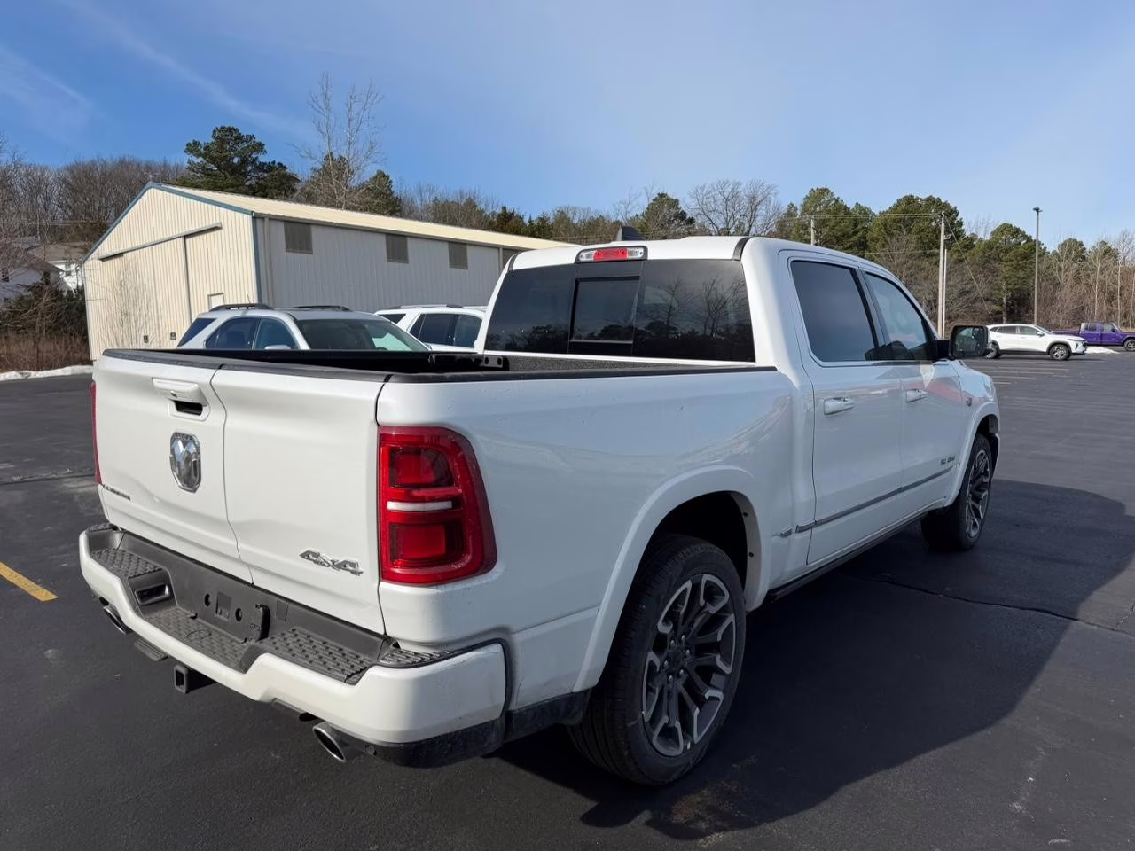 2026 Ivory White Tri-Coat Pearlcoat Ram 1500 Limited 4X4 Truck