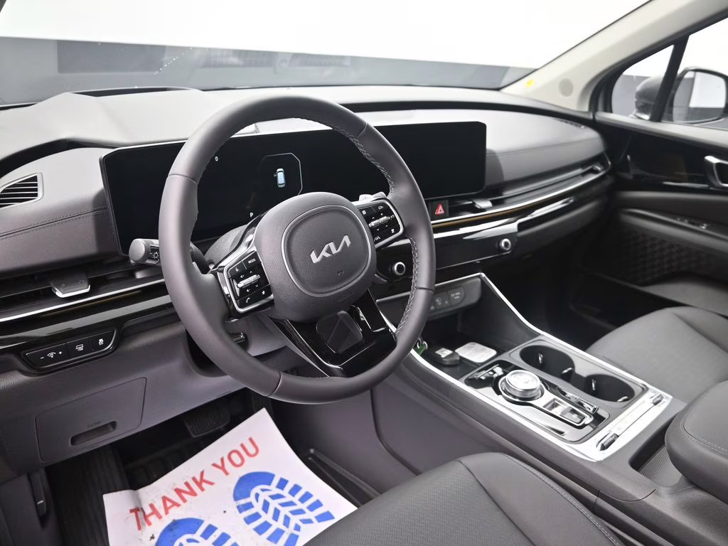 2026 Ceramic Silver Kia Carnival Hybrid SX Prestige FWD Van