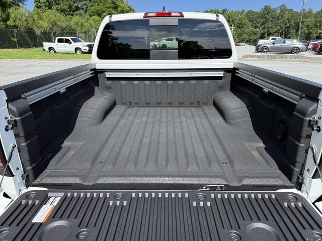 2025 Glacier White Nissan Frontier SV RWD Truck