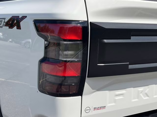 2026 Glacier White Nissan Frontier PRO-4X 4X4 Truck