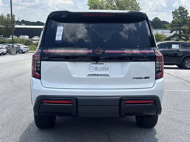 2025 Aspen White Tricoat/Super Black Nissan Armada PRO-4X 4X4 SUV