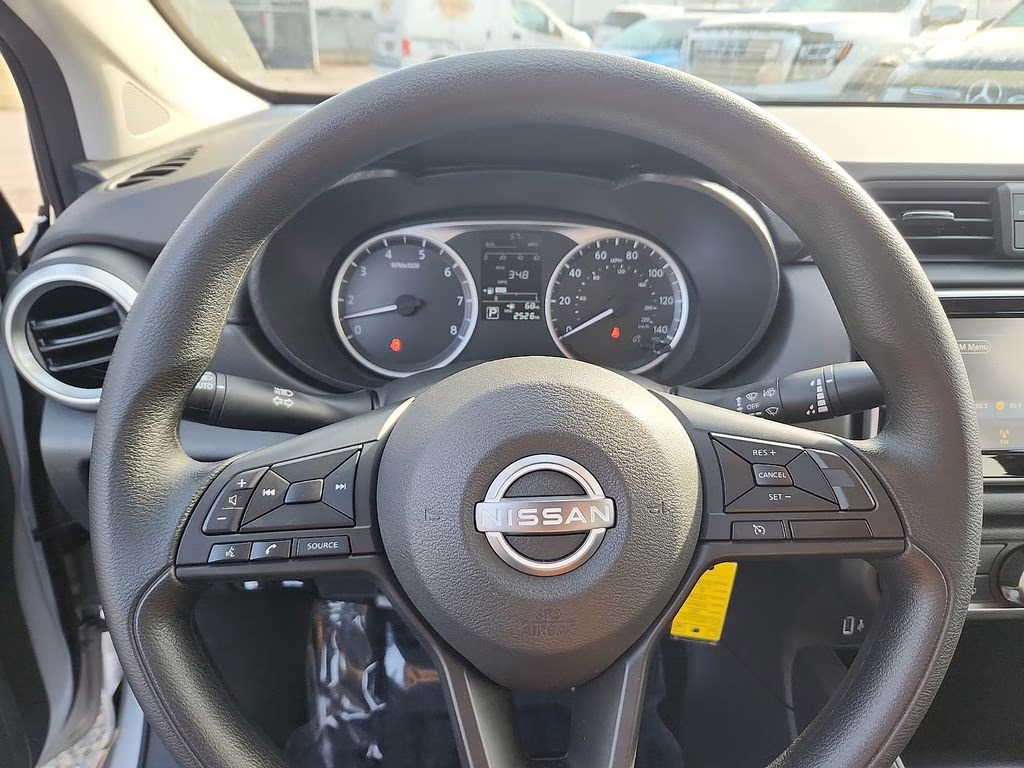 2025 Brilliant Silver Metallic Nissan Versa 1.6 S FWD Sedan