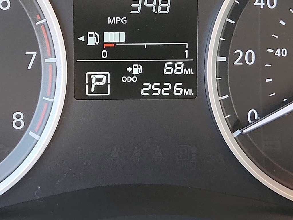 2025 Brilliant Silver Metallic Nissan Versa 1.6 S FWD Sedan